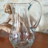 Pitcher decorating grape bunch