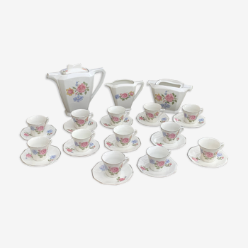 White porcelain coffee service with pink and blue flower pattern, composed of 27 pieces, stamped,