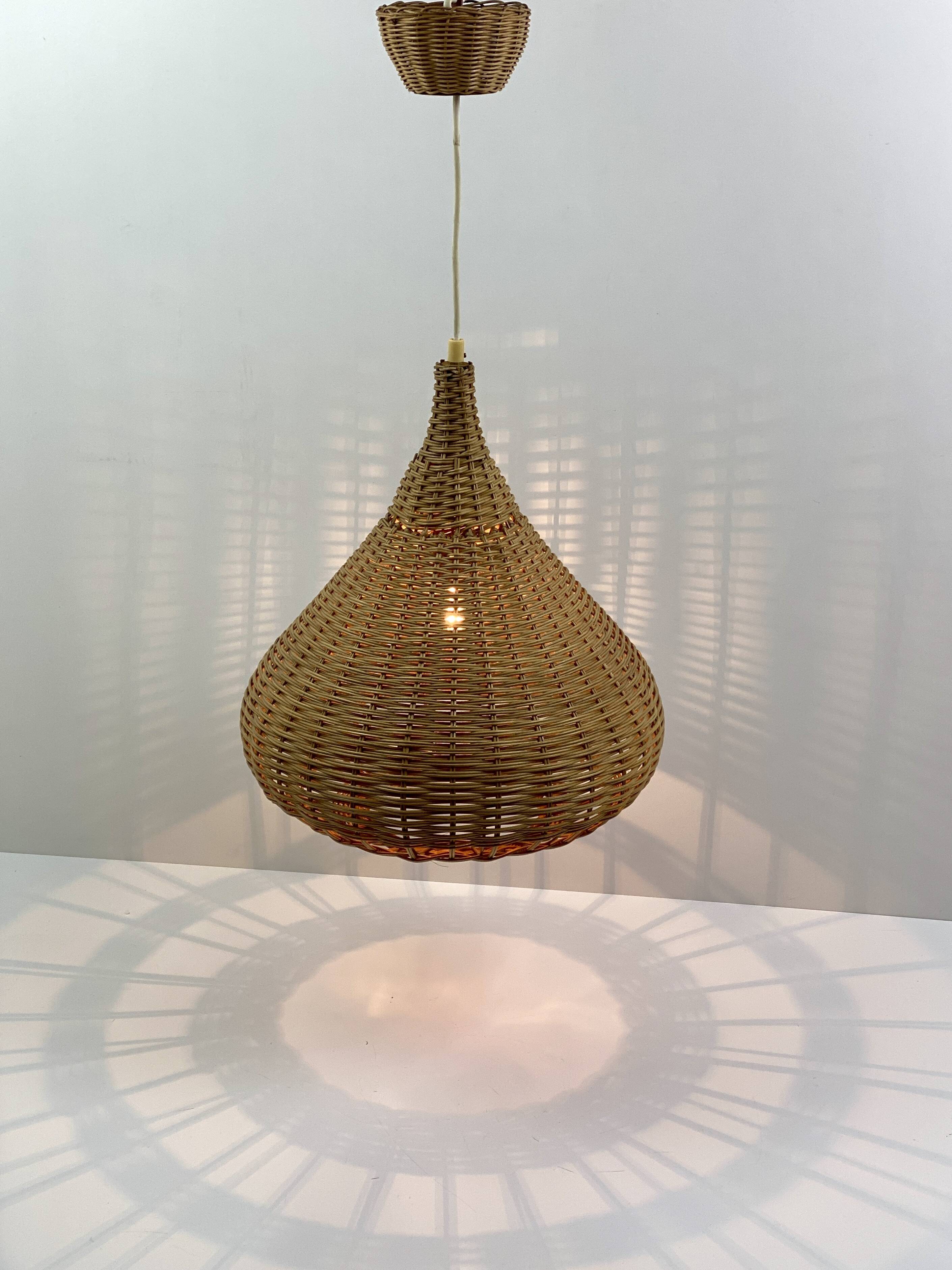 Vintage wicker pendant light from the 1960s.