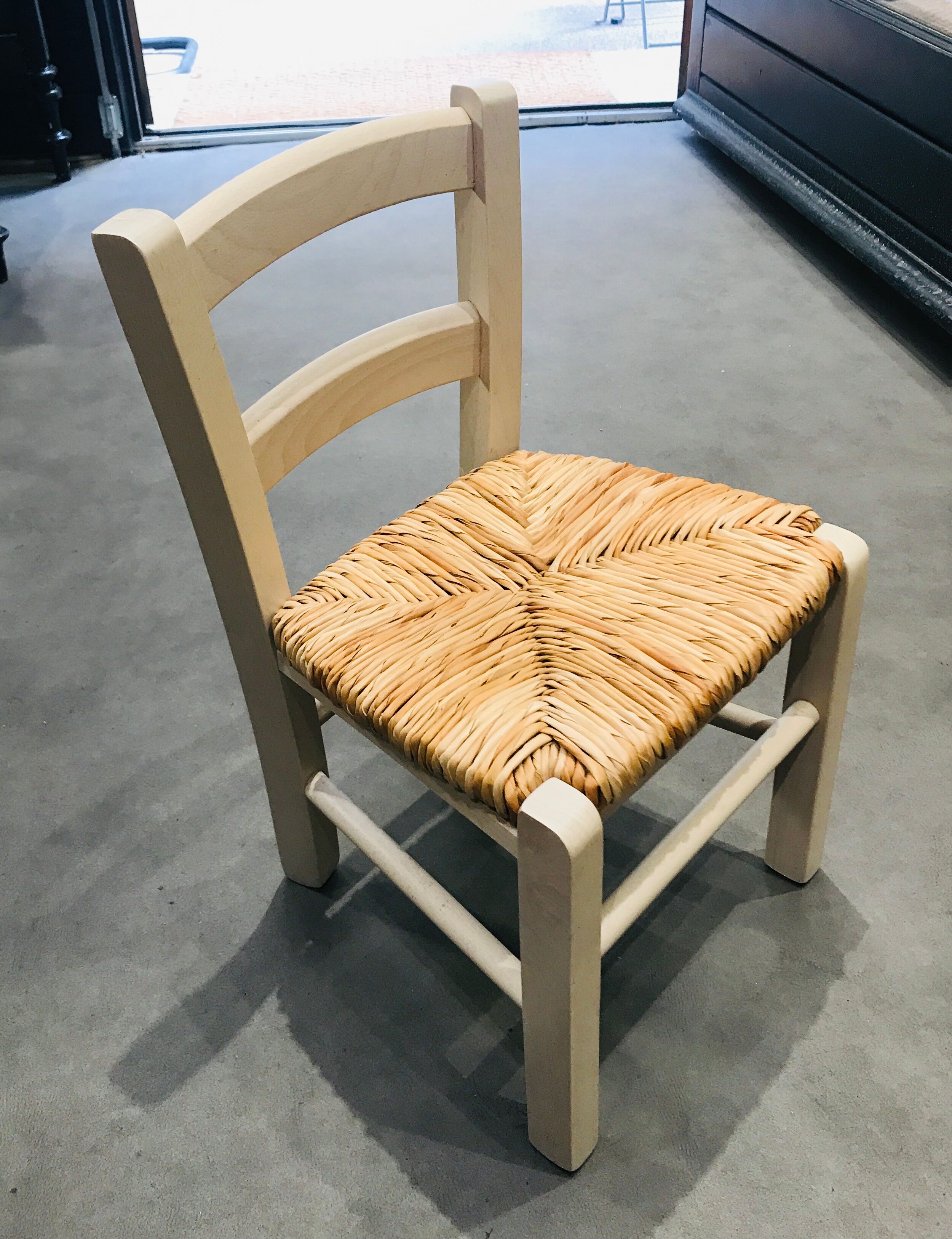 Straw seated wooden chair