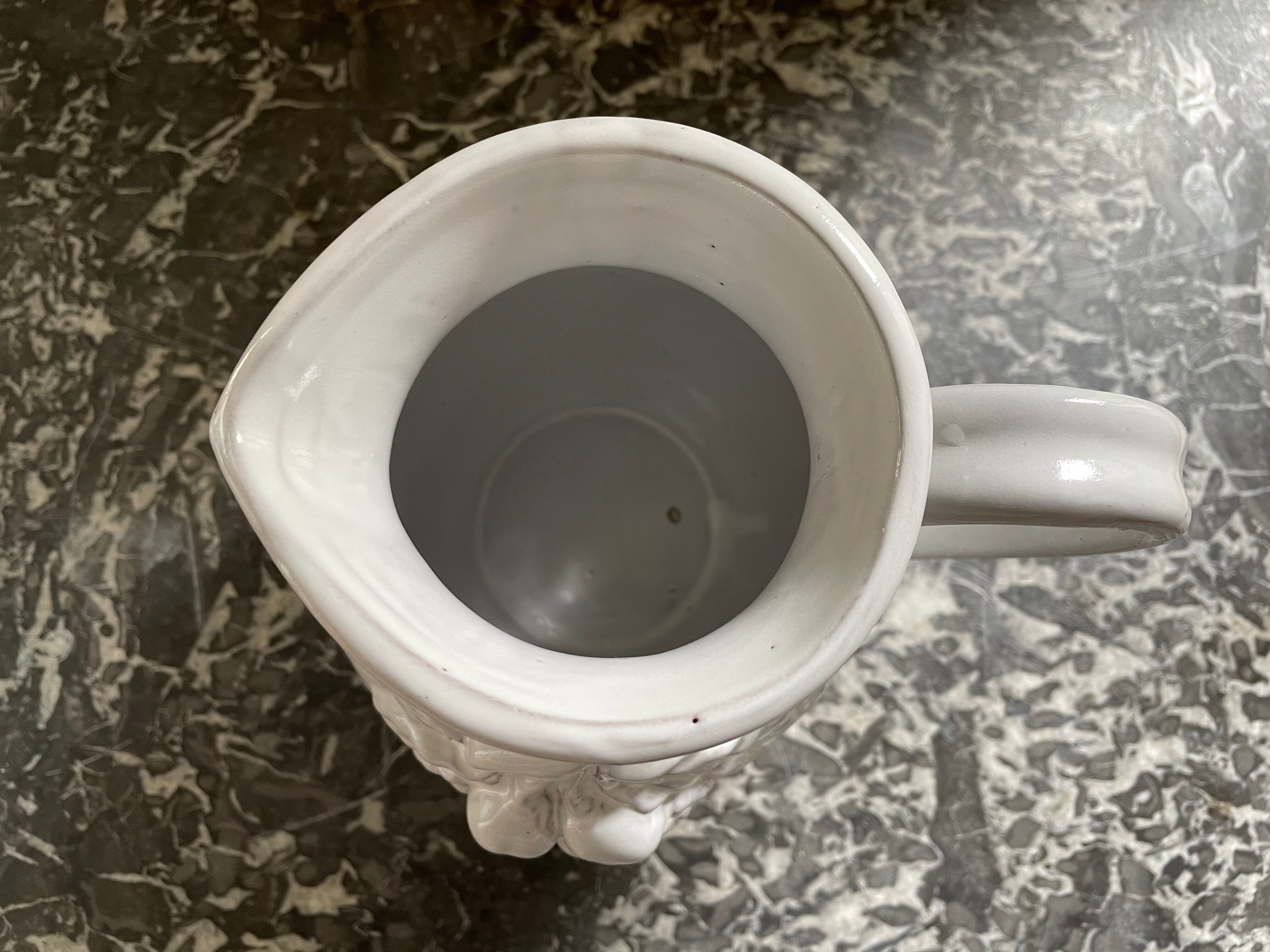 Pitcher in dabbling cherry decoration