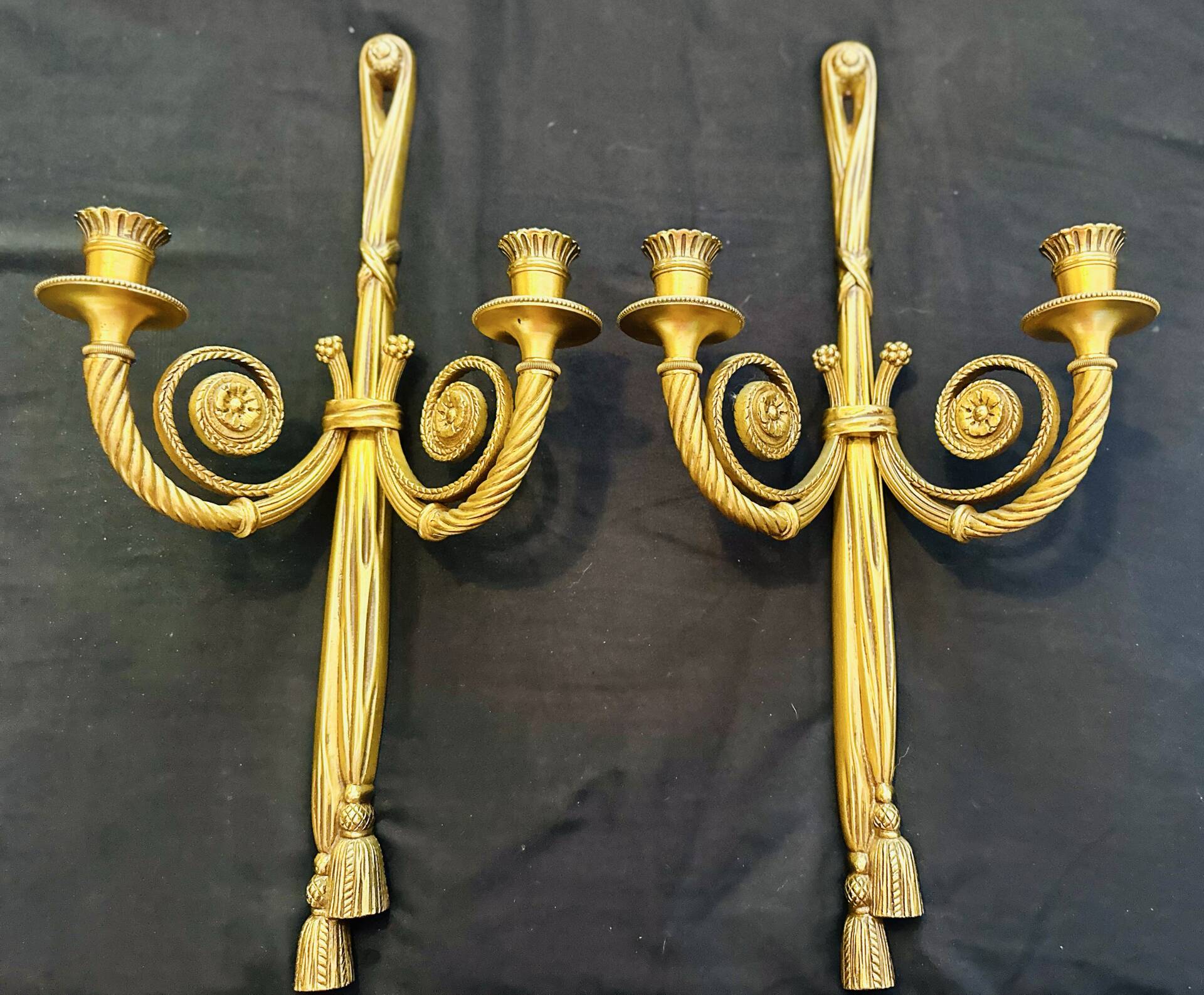 Pair of gilded bronze wall sconces in the Louis XVI style. 20th century.