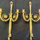 Pair of gilded bronze wall sconces in the Louis XVI style. 20th century.
