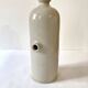 Old horizontal glazed stoneware hot water bottle, late 19th century.