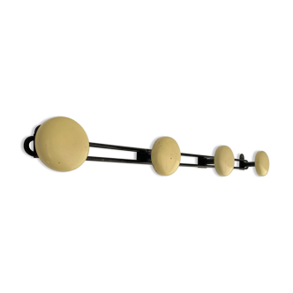 Vintage black lacquered metal wall coat rack with 4 round yellow lacquered hooks