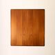 Table basse scandinave vintage en teck avec bord sculpté