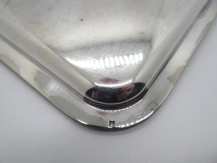 Small silver metal top