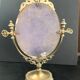 Miroir en bronze pivotant