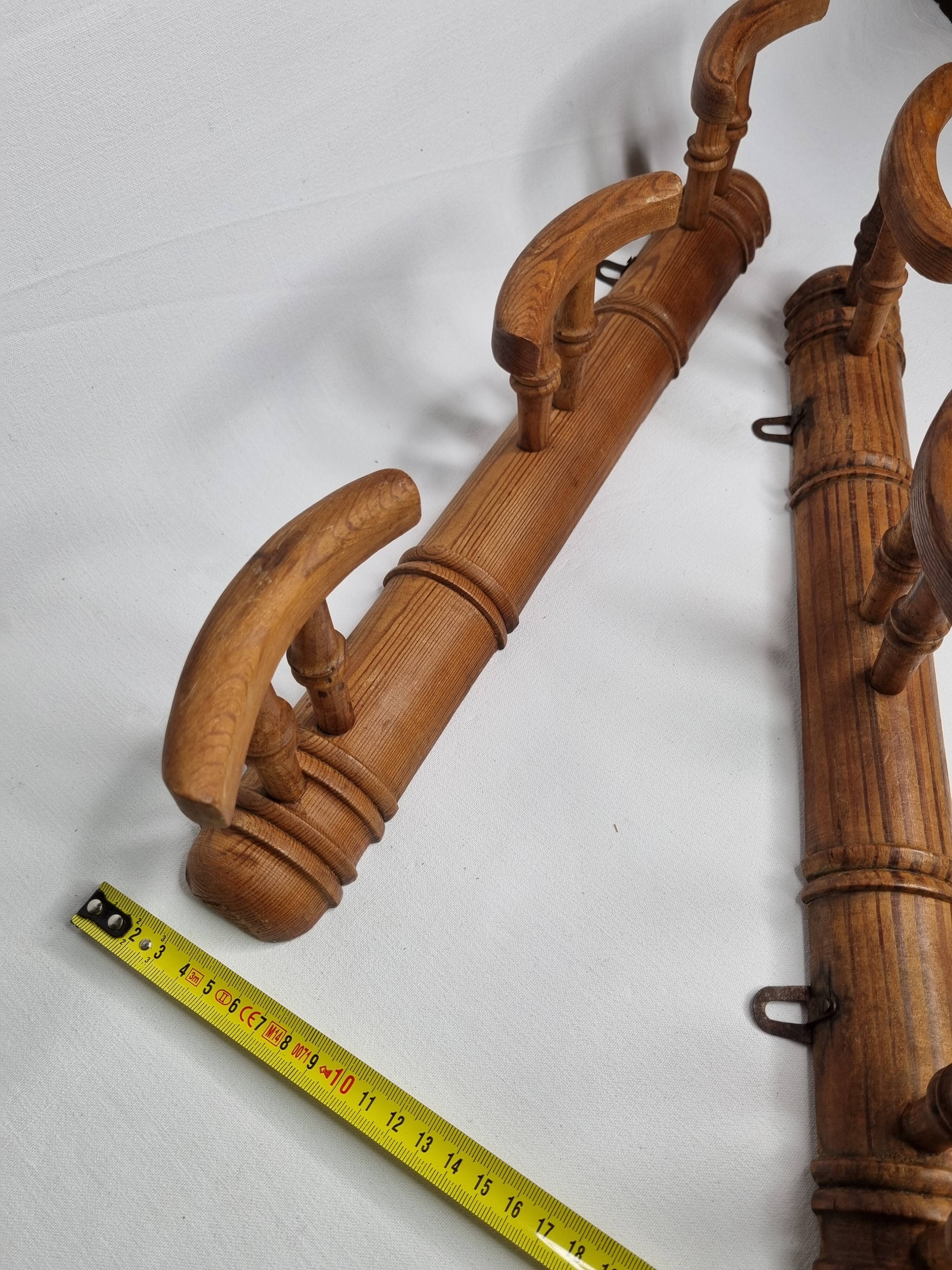 Pair of turned wooden coat racks in imitation of bamboo, 50 cm