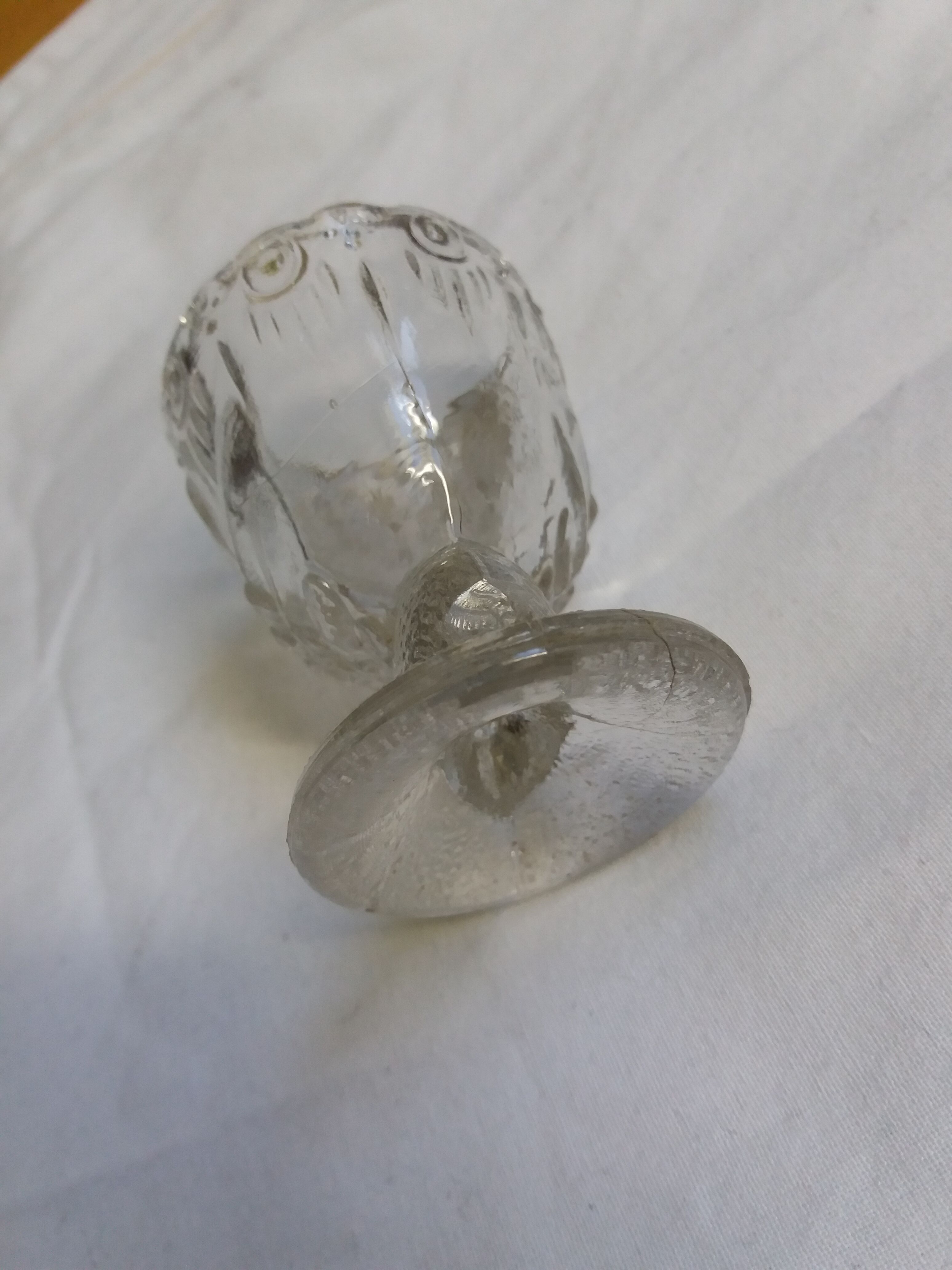 Molded glass egg cup with pigeon bird