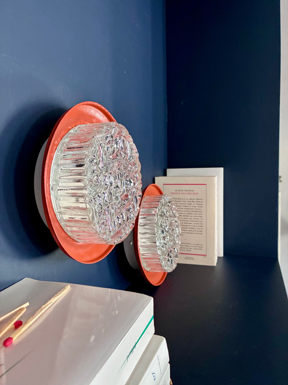 Pair of 70's wall lights in cut glass.