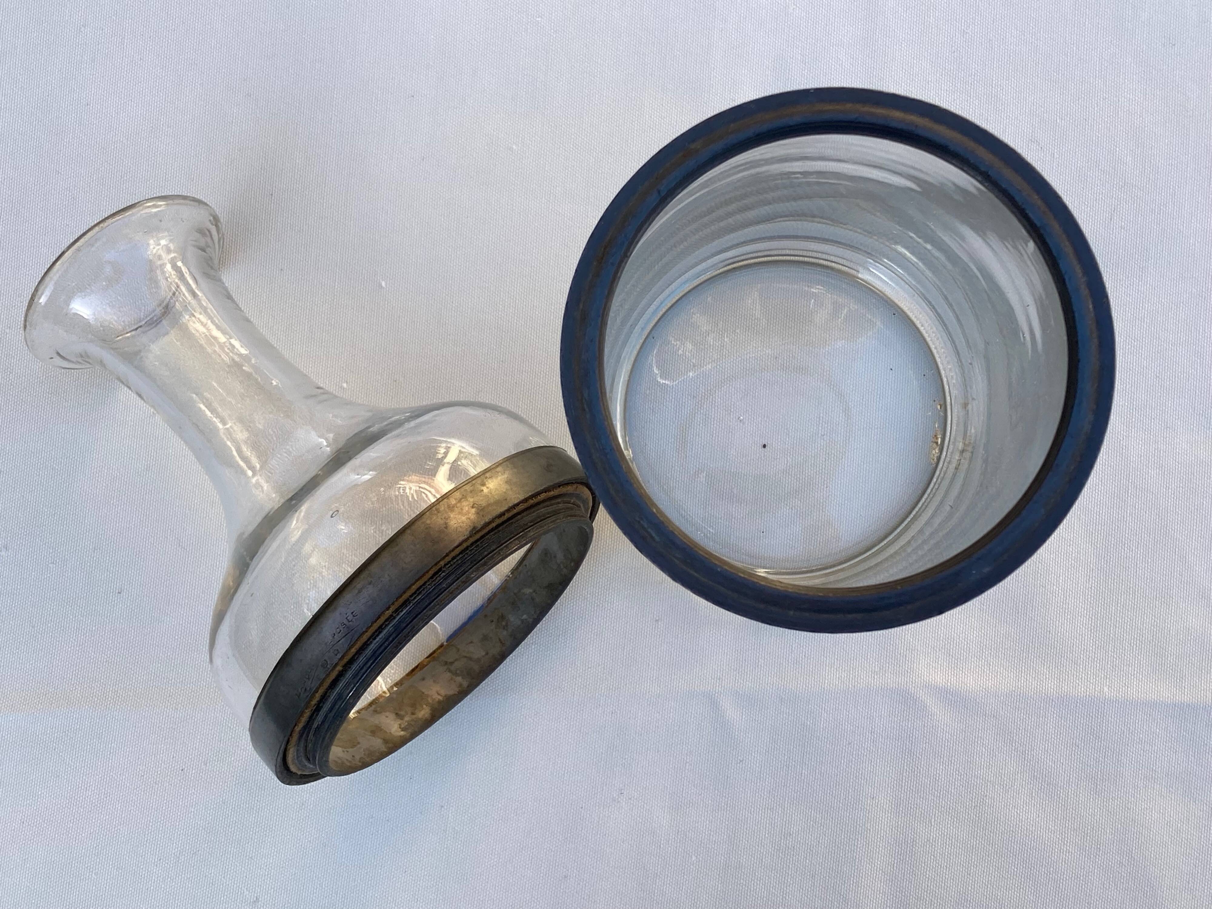 Glass and pewter screw carafe, early 20th century