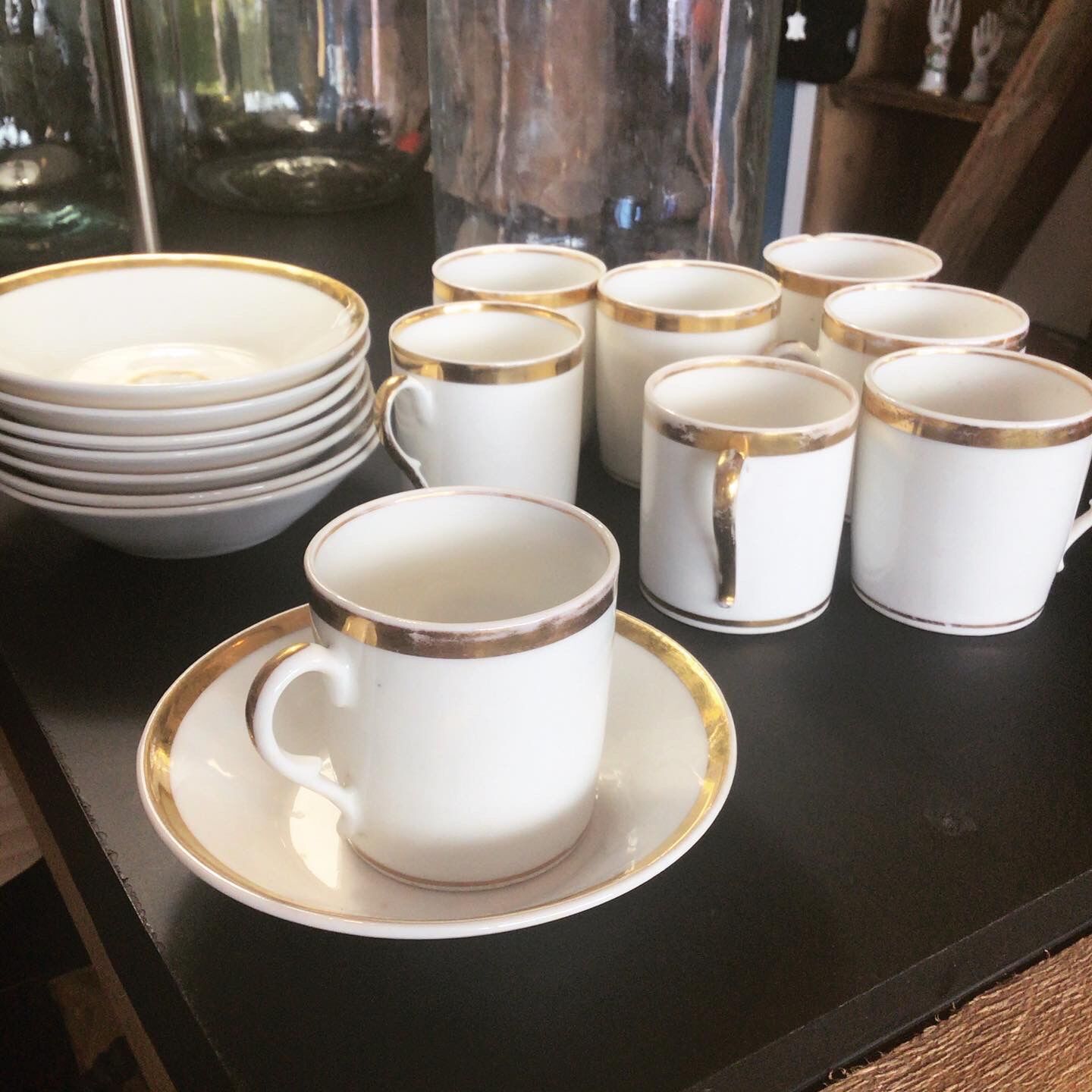 Lot of eight coffee cups and under cups