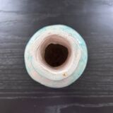 Green and white signed vase