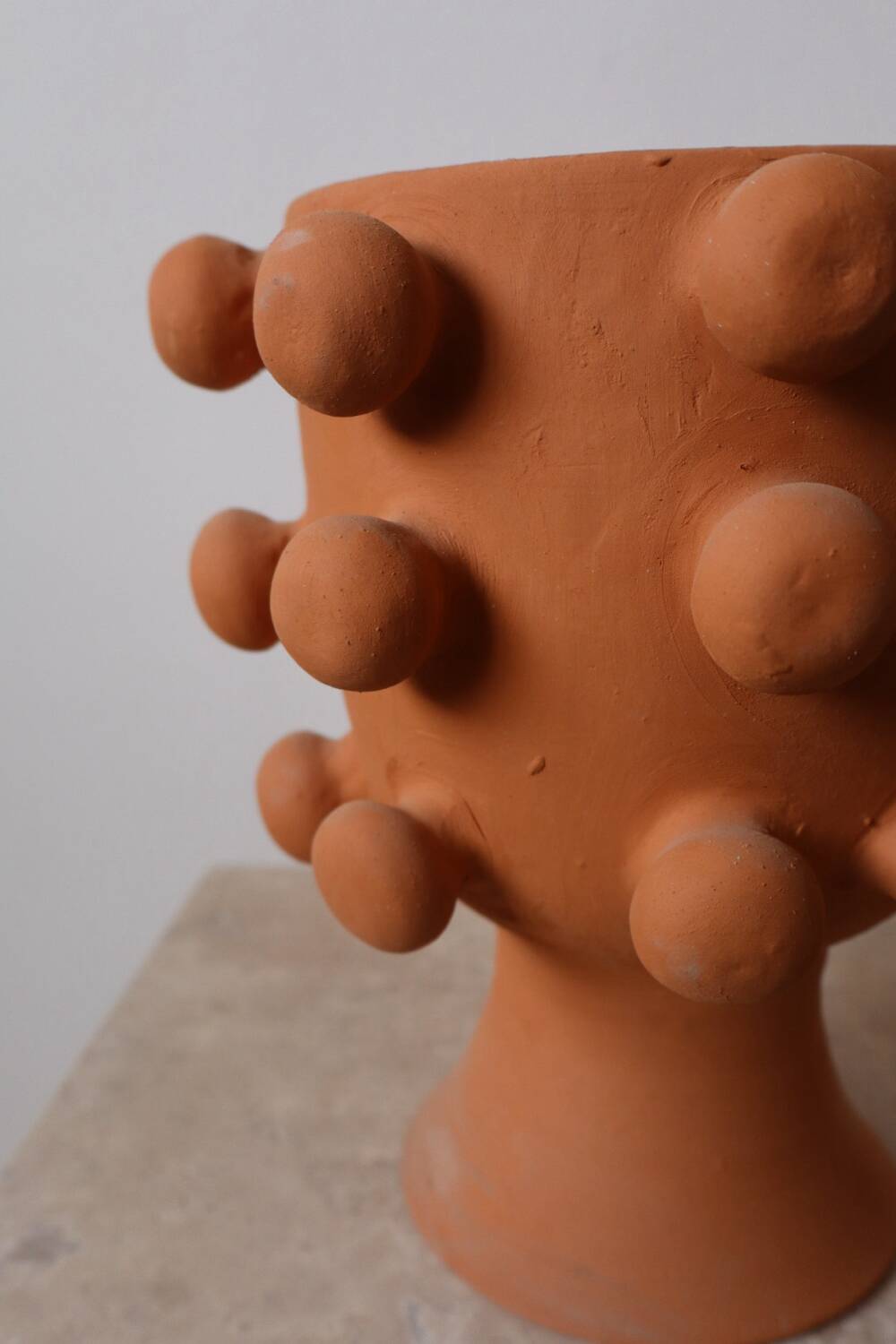 Handmade terracotta sculptural cache pot vase