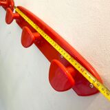 Orange/red plastic hooks year 60