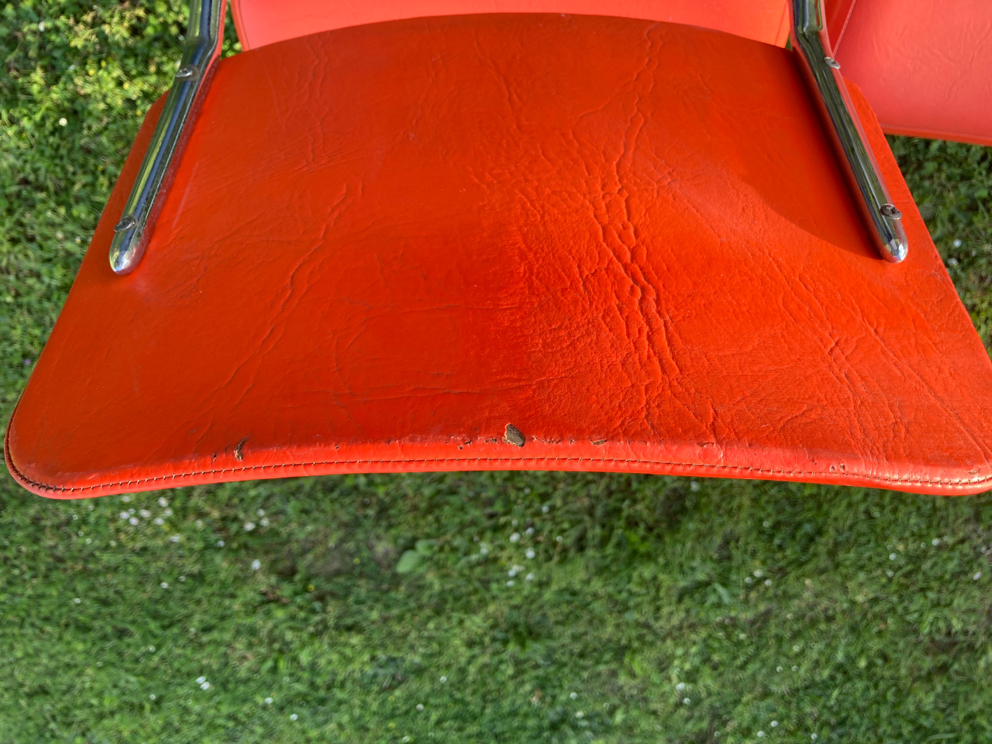 Series of 4 vintage orange chairs