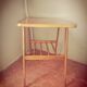 Scandinavian table with compass legs + magazine rack.