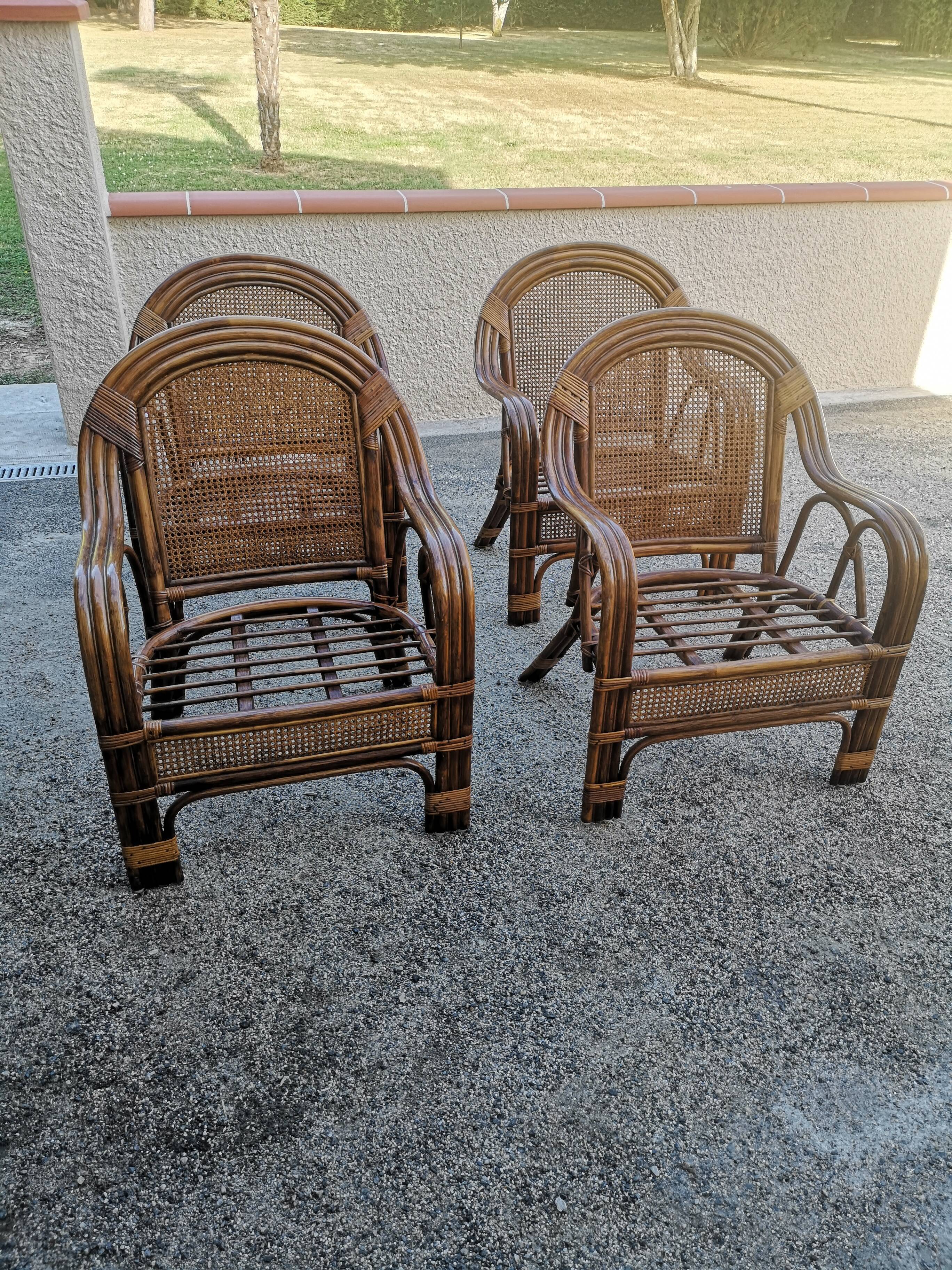 4 vintage rattan armchairs