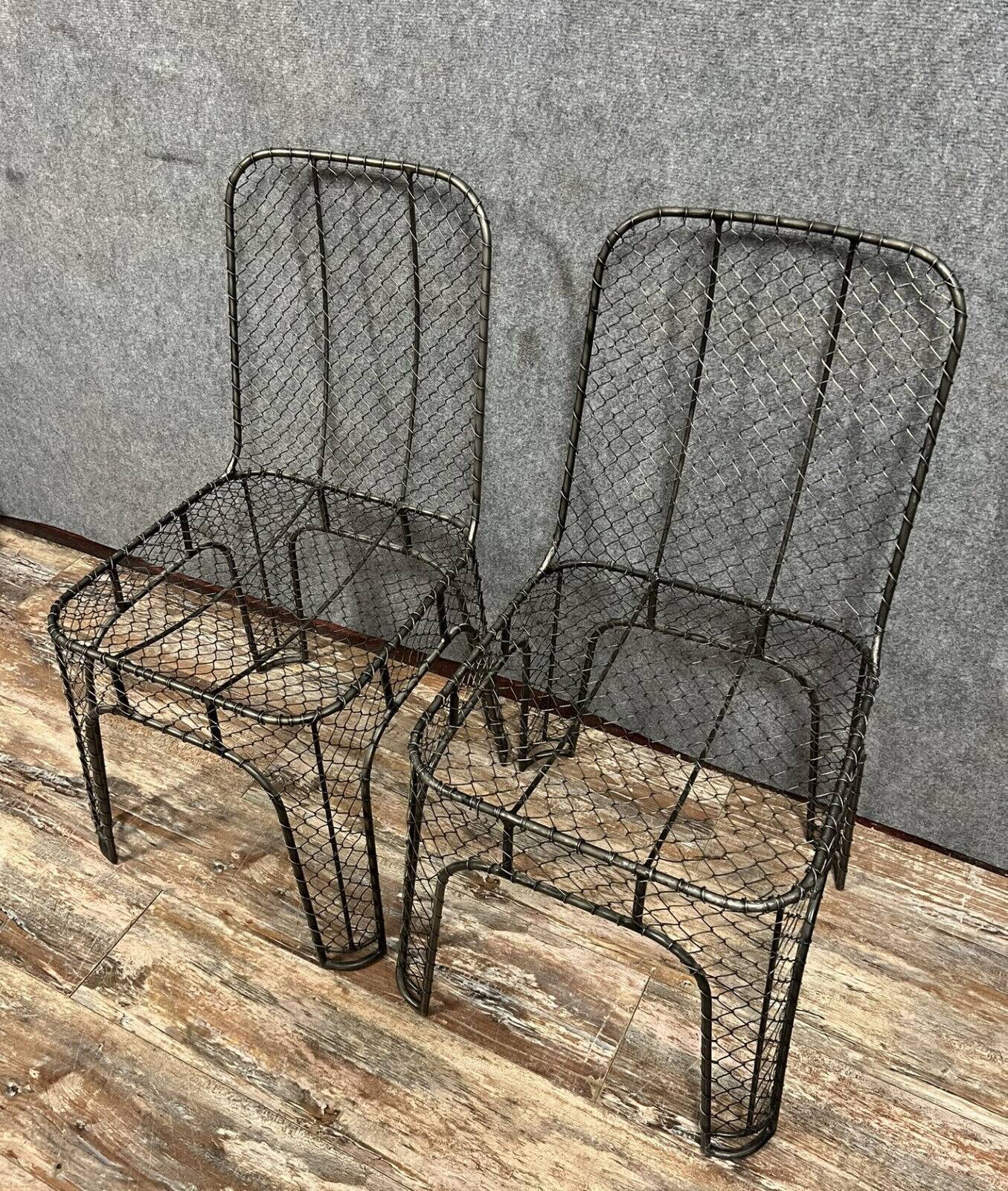 Pair of industrial design chairs in woven iron circa 1980