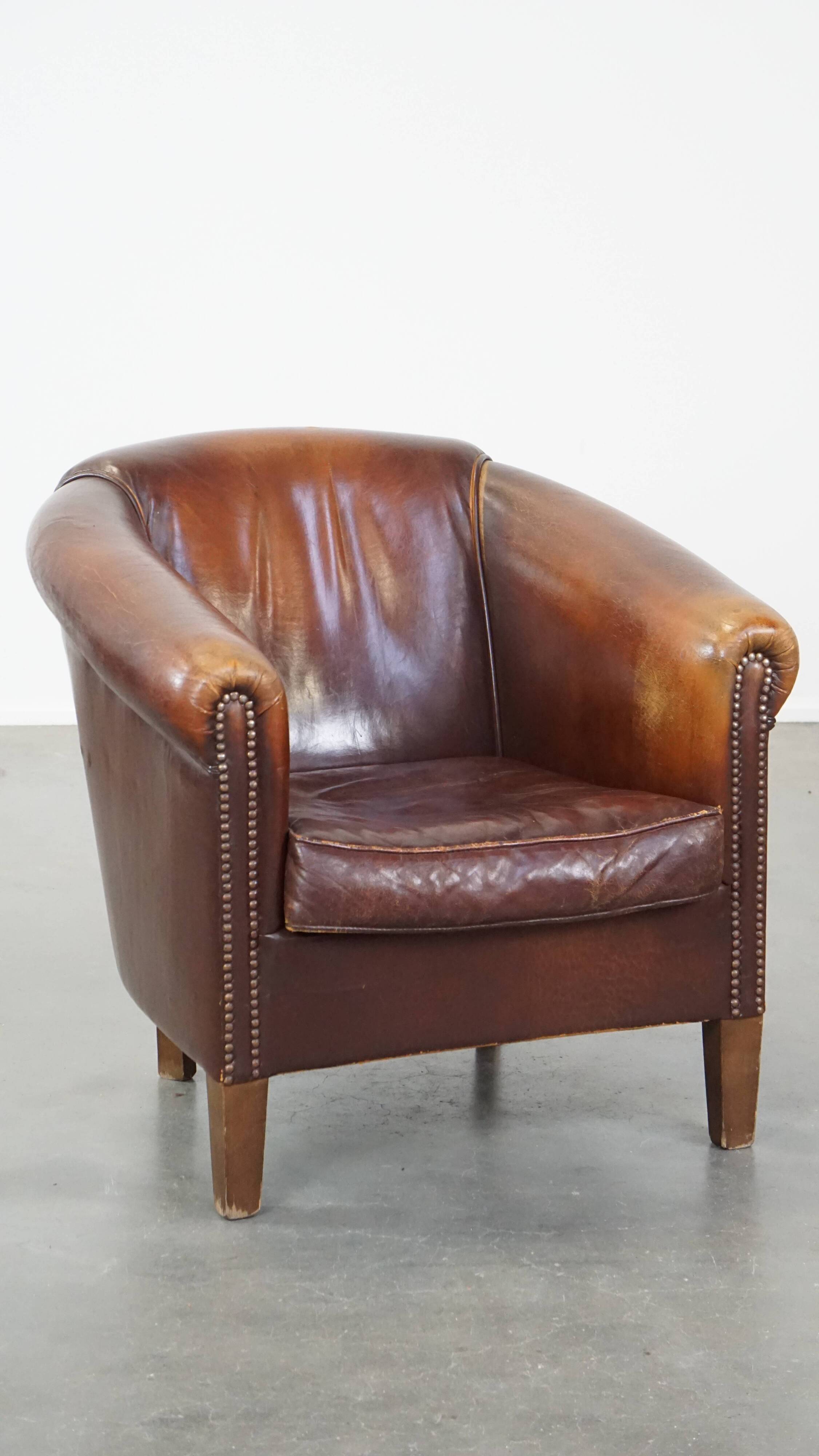 Vintage club armchair made of sheep leather