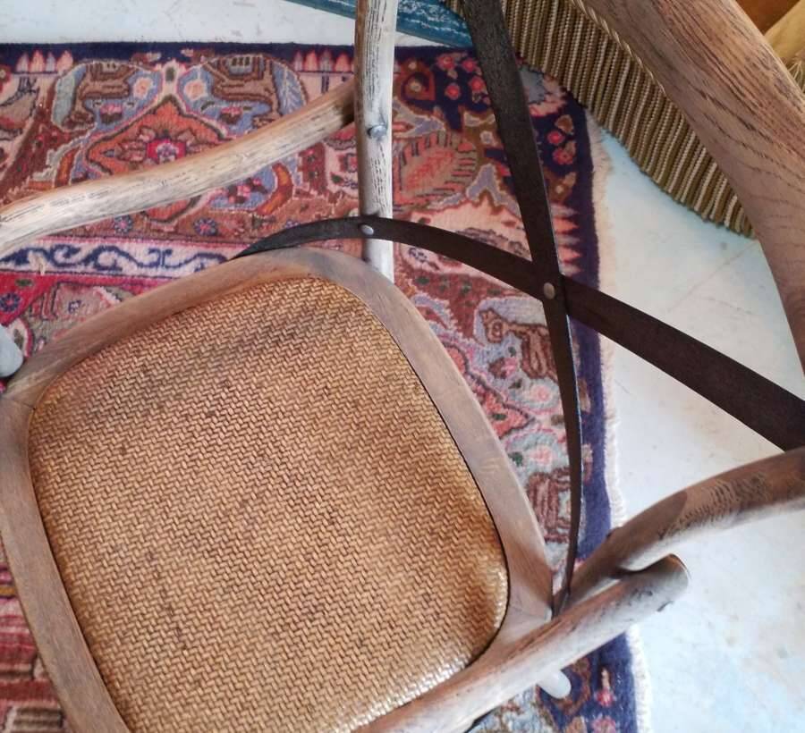 Angled wooden armchairs