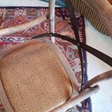 Angled wooden armchairs