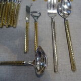 Ménagère en métal argenté et doré 104 couverts