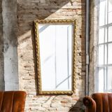 Vintage mirror cut out in a gilded wooden frame