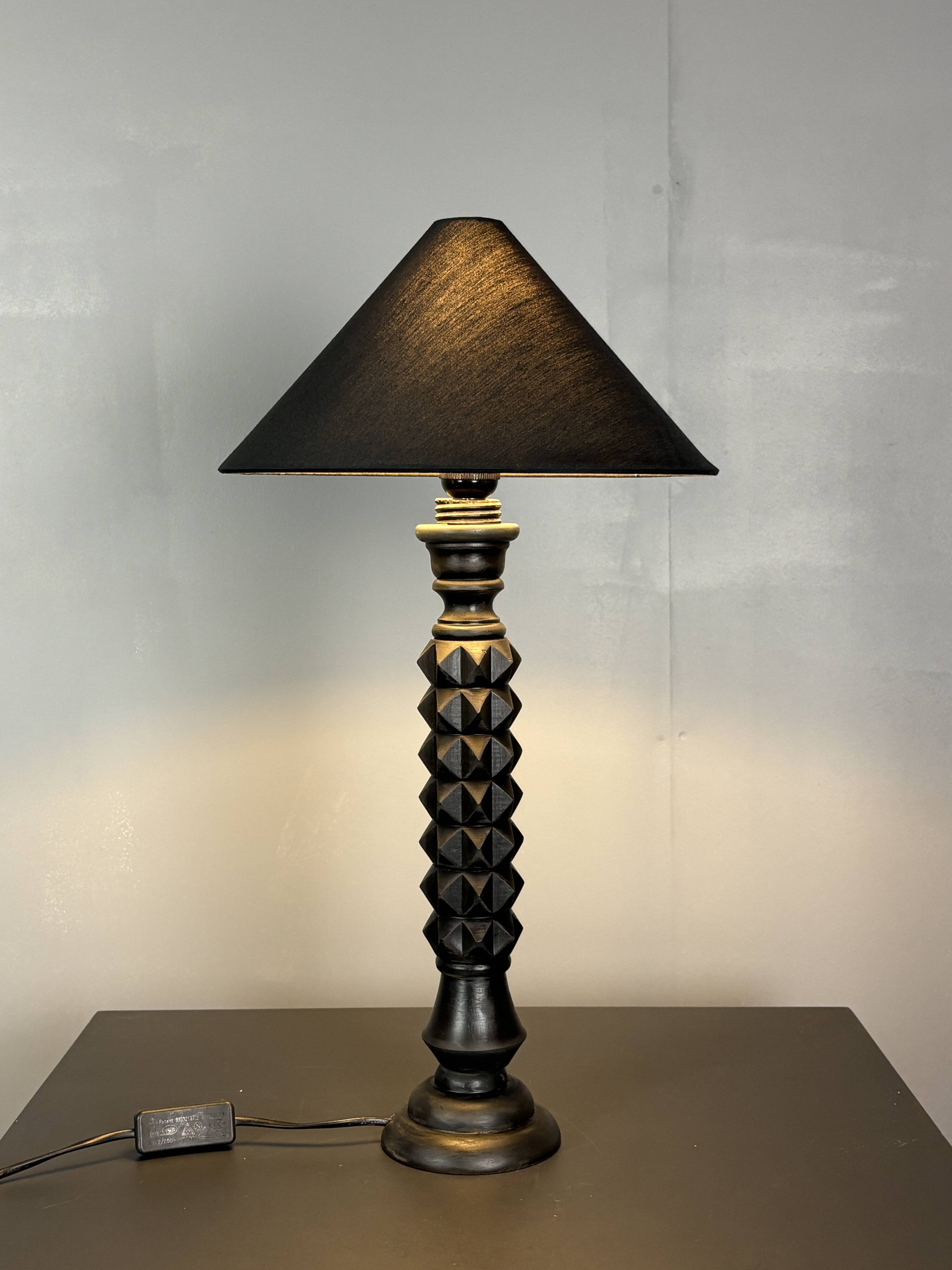 Brutalist wood turned ebonized table lamp in the style of Charles Dudouyt