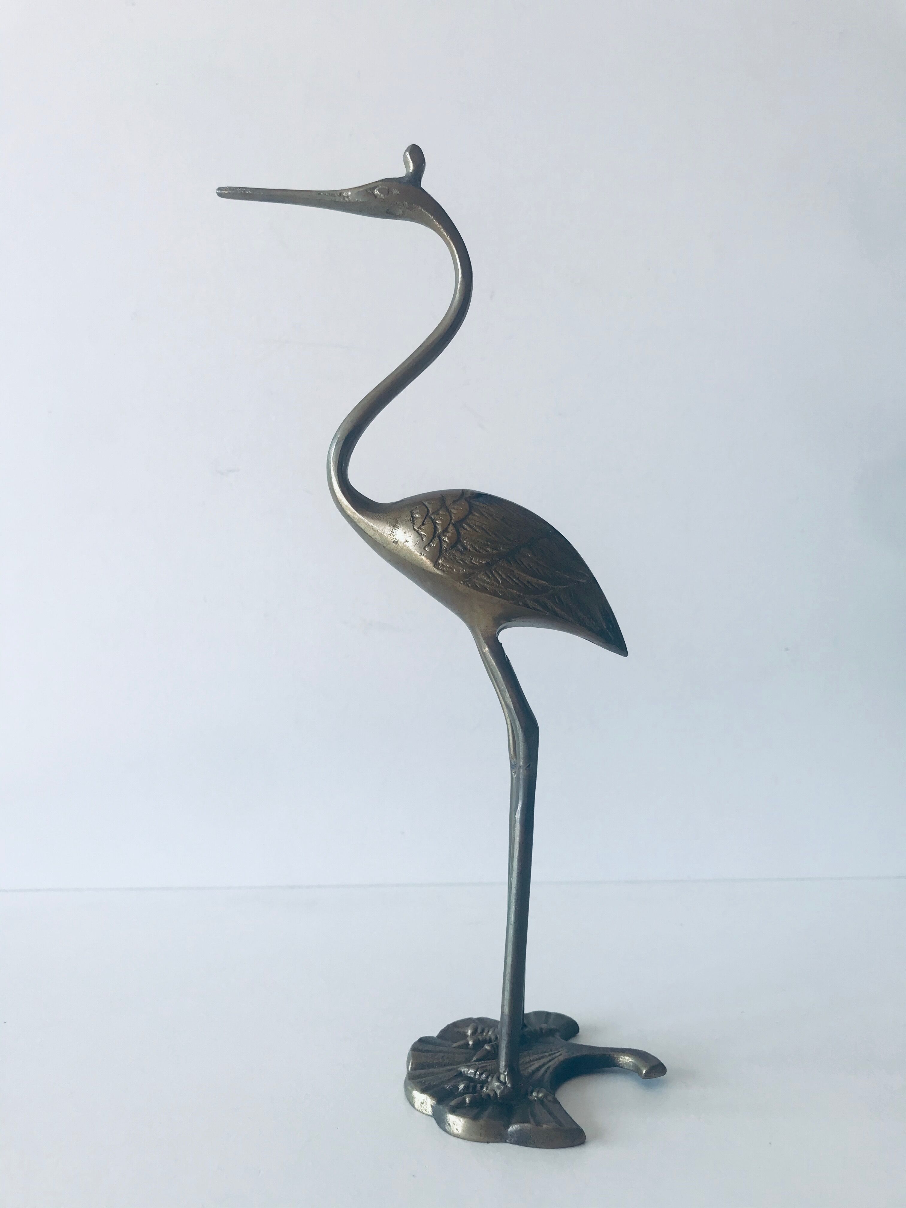 Heron, brass bird