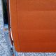 Pair of designer armchairs in orange fabrics and chrome tubes from the 70s