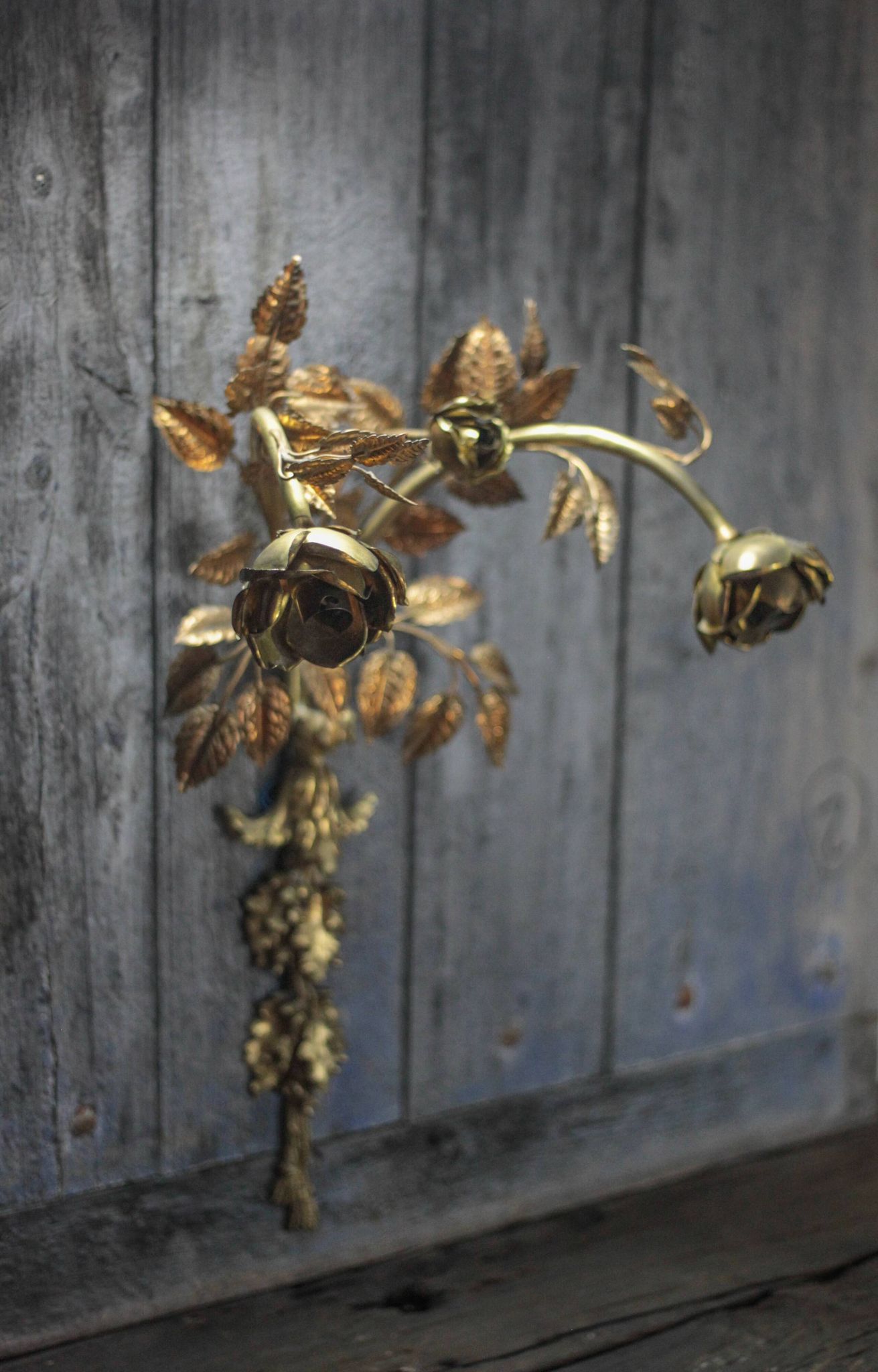 Pair of bronze and gold metal floral wall sconces, flower wall lamp.