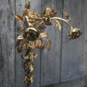 Pair of bronze and gold metal floral wall sconces, flower wall lamp.