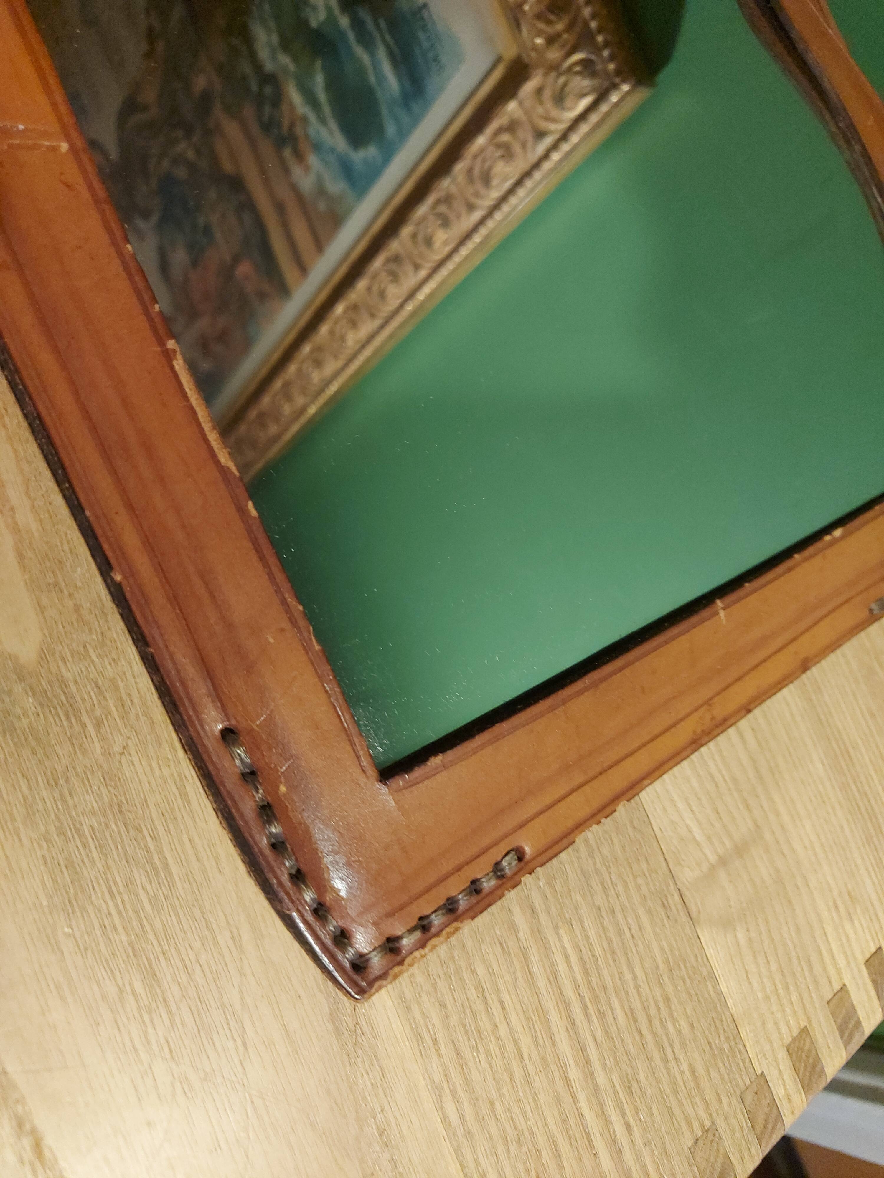 Vintage leather mirror
