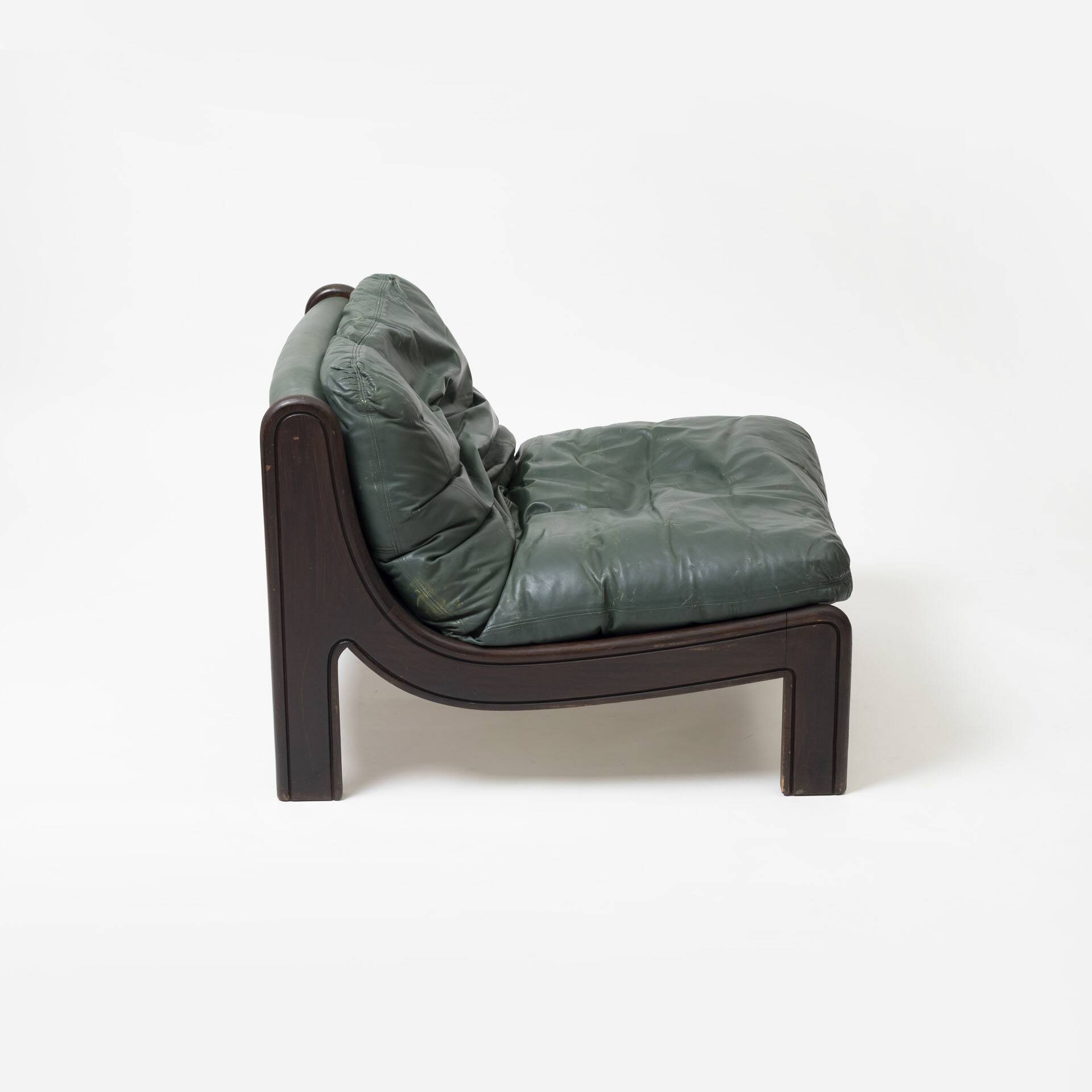Pair of low sling chairs in hardwood and leather, Germany, 1970s