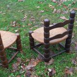 1 pair of low straw armchairs