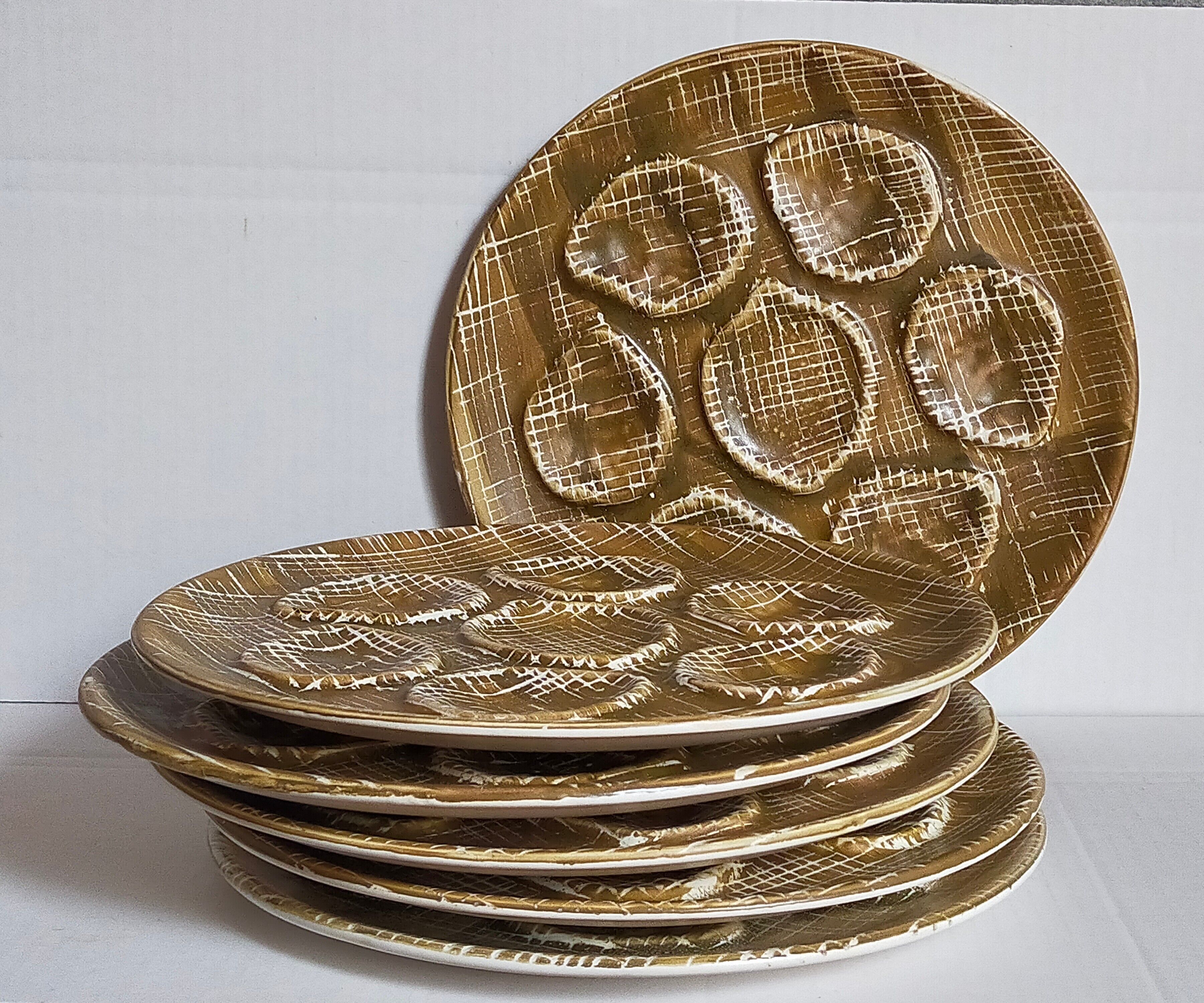 Six oyster plates earthenware with matte enamel, 50s