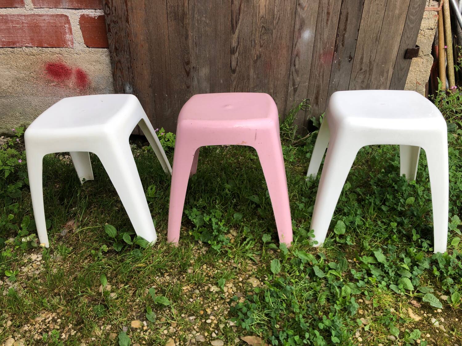 Series of 3 old vintage white & pink plastic stools