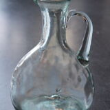 Bouteille ancienne en verre soufflé