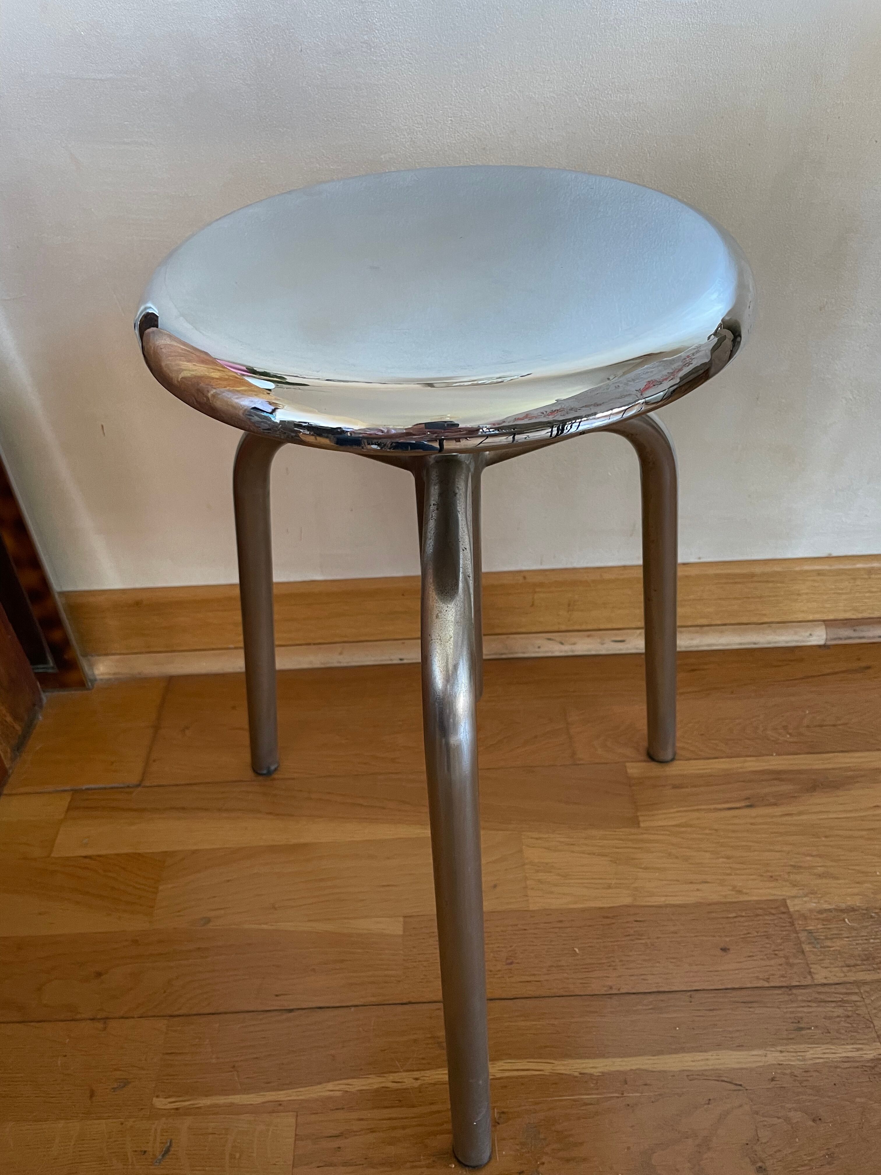 Chrome screw stool of hairdresser workshop