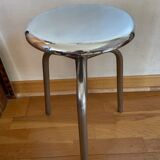 Chrome screw stool of hairdresser workshop