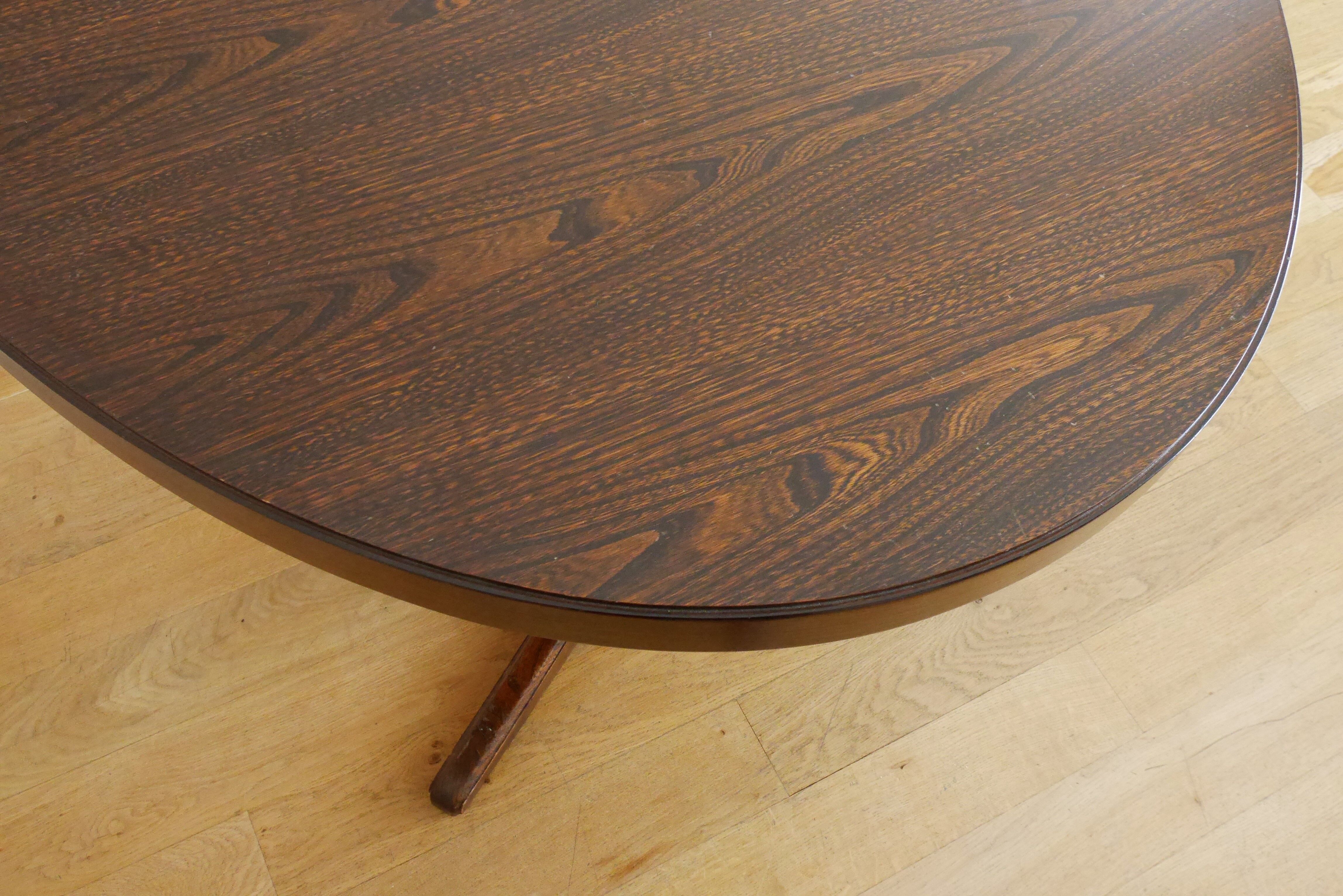 Extendable oval elm table with Baumann extensions