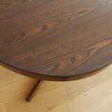 Extendable oval elm table with Baumann extensions