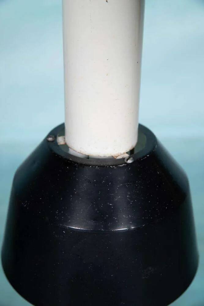 Vintage pendant light design, retro black and white ambient lamp.