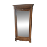 Antique Louis-Philippe walnut veneered wardrobe with an antique mirror.