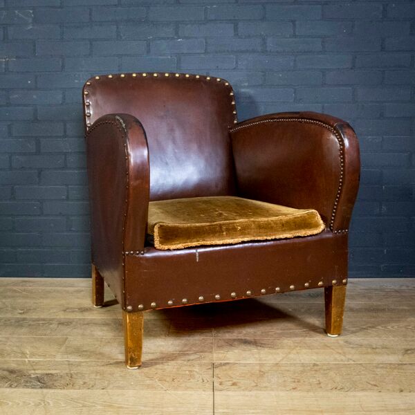 Fauteuil club antique en tissu de cuir