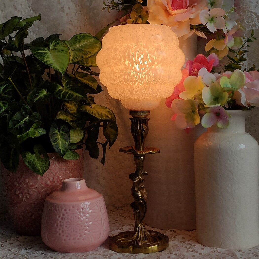 Pink clichy globe lamp and golden metal foot