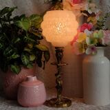 Pink clichy globe lamp and golden metal foot