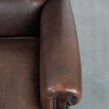 Characterful sheep leather armchair with a beautiful deep colour